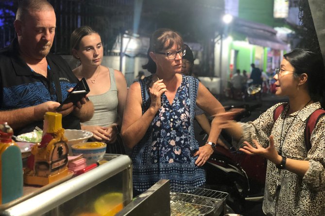 Saigon Evening Food Tour by Scooter - Local food streets and changing districts