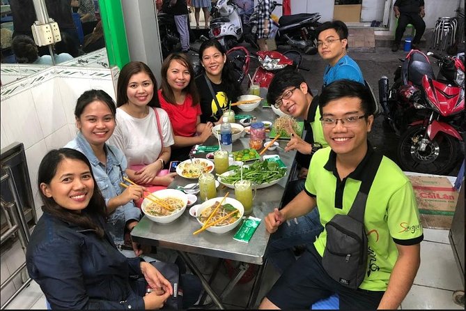 Saigon Night Sights & Local Food by Motorbike| Opt: Ao Dai Riders - Fish noodle soup starts the evening