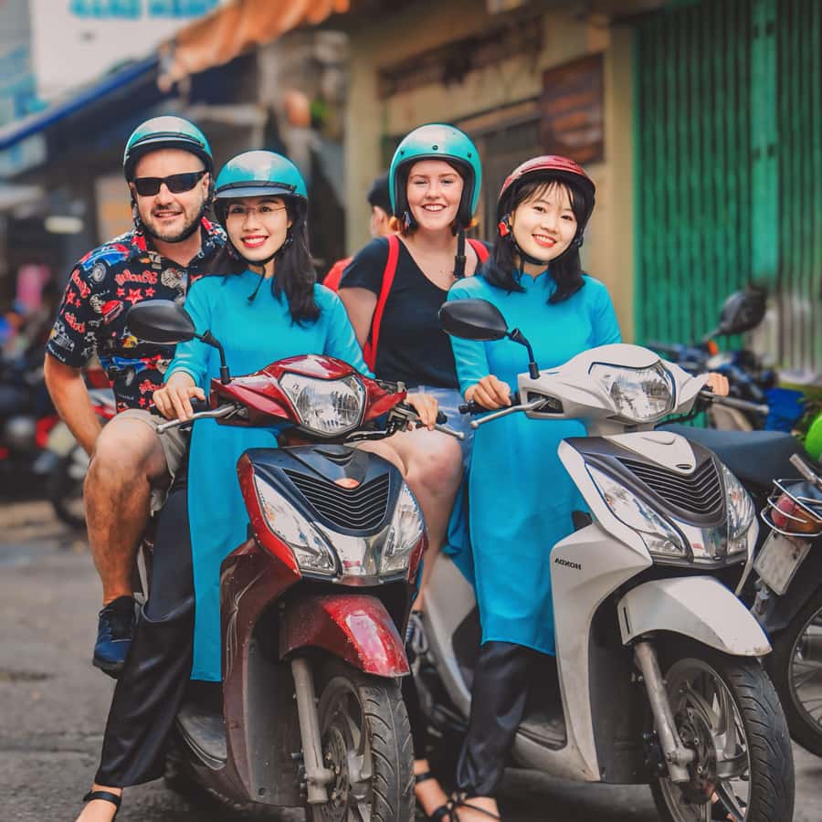 Saigon: Street Food Tasting & Sightseeing Tour by Motorbike - Grilled plantain and crispy pancakes