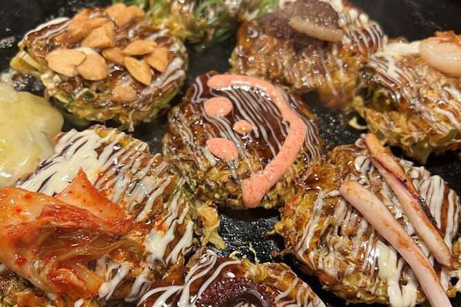Same-Day Osaka Food Crawl with local food and Hidden gems - Dotonbori’s lights and famous signs