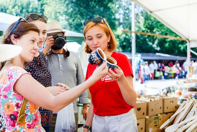 Taste Bucharest: A Food Lover's Tour of Markets & Neighbourhoods - Riding the tram toward Communist-era Bucharest