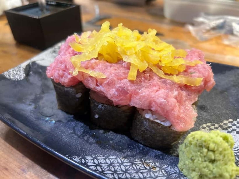 Tokyo: Shinjuku Food Tour (15 Dishes and 4 Eateries) - Kabukicho: bright signs, nightlife, and a final round of food