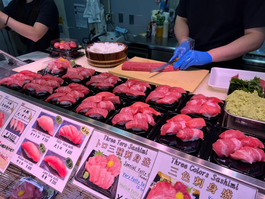 Tokyo: Tsukiji Fish Market Guided Walking Tour - Meeting at Tsukiji Station and entering the temple