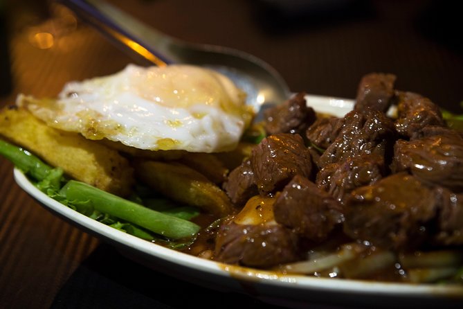 Ultimate Phnom Penh Food Tour by Tuk Tuk: 20 Tastings and Drinks - Kandal Market and a local success story