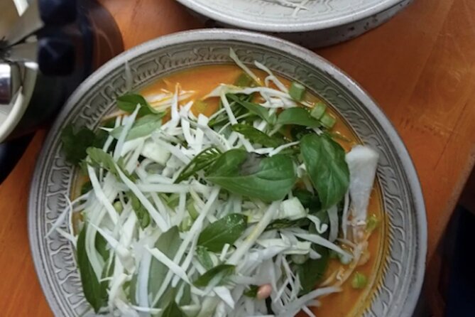 Ultimate Phnom Penh Food Tour by Tuk Tuk: 20 Tastings and Drinks - Russian Market after dark