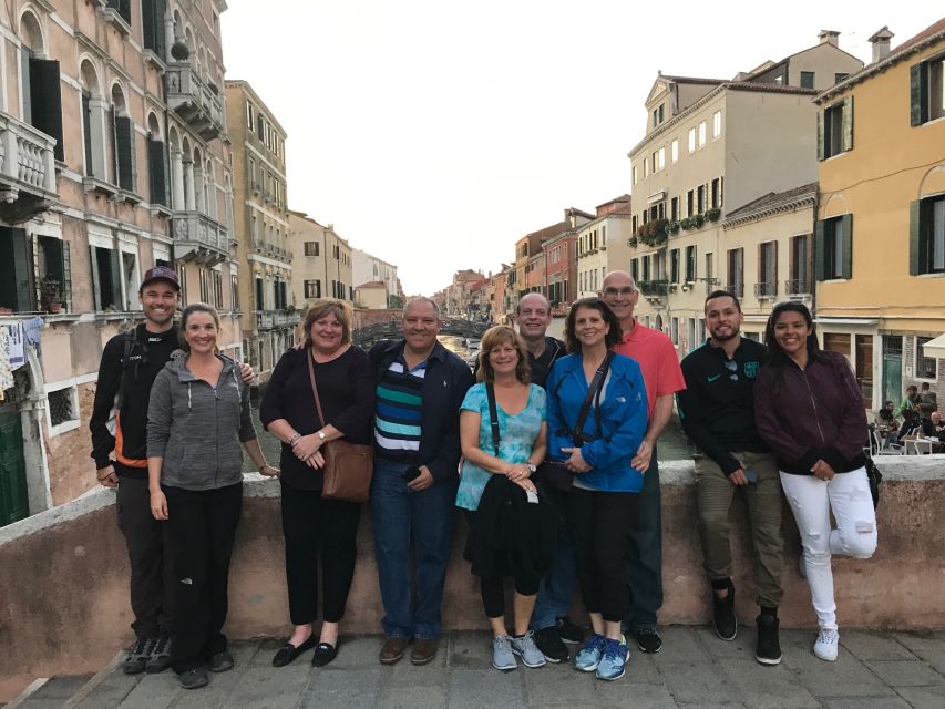 Venice: Street Food Tour with a Local Guide and Tastings - Crossing the Rialto Bridge to the market
