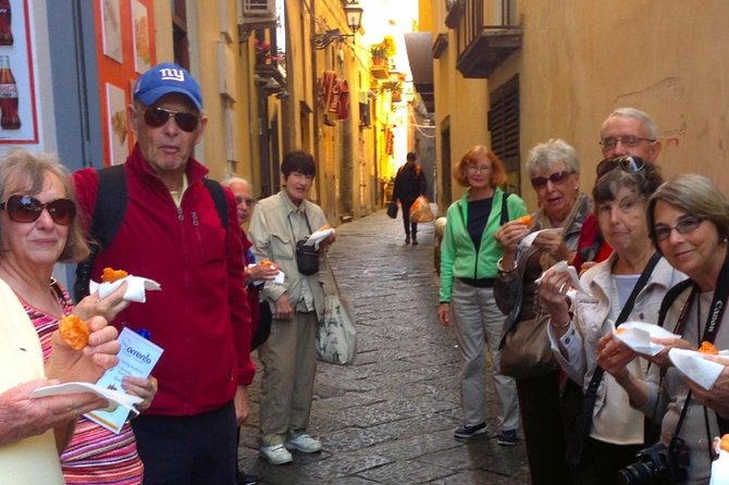 Walking Food Tour in Sorrento w/ Limoncello Factory Lemon Grove - A seated trattoria meal with pasta and wine
