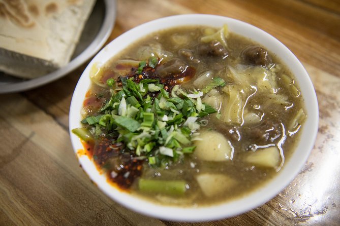Xi'an Evening Food Tour by TukTuk - Xi’an food begins in the old city lanes